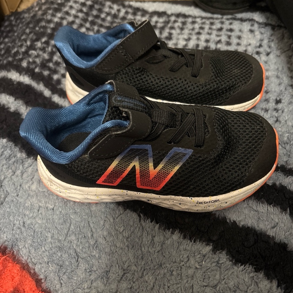 New Balance Kids' Black and Blue Sneakers with Red Accents